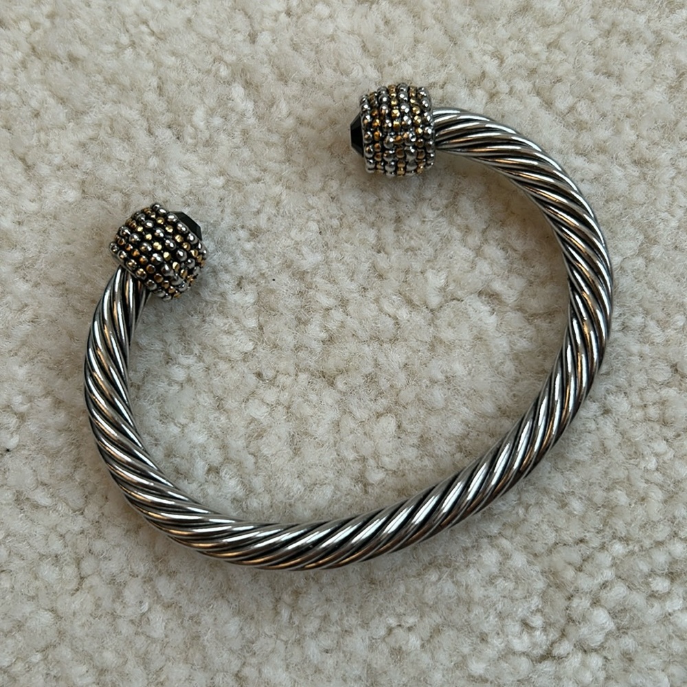 Silver colored cuff bracelet